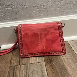 Genuine Leather Made in Italy clutch with grommet details Vintage Red color